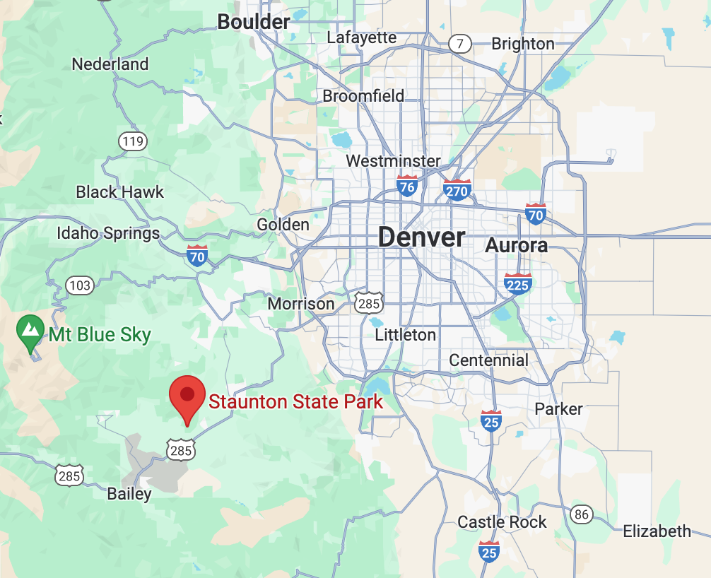 A map of Denver with a pin on Staunton State Park in the mountains southwest of the city